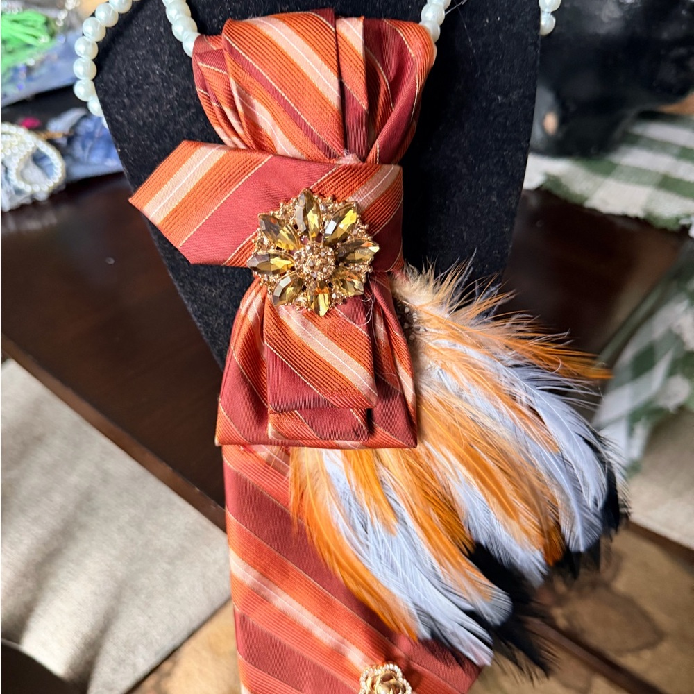 Striped Orange Feather Tie Brooch with Gold Floral Jewel junk tie